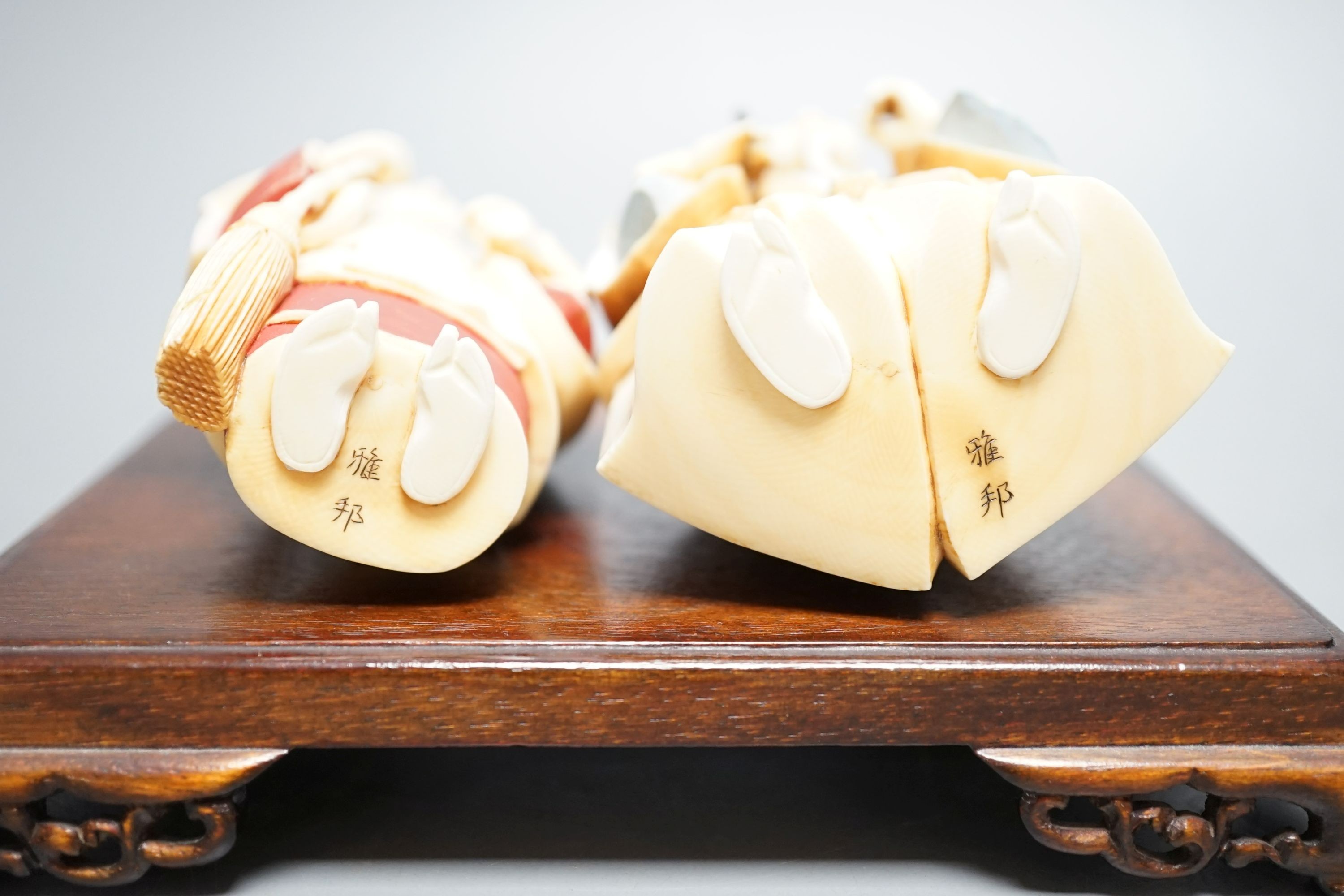 Two Japanese stained ivory figures of court servants, Taisho/early Showa period, signed - tallest 11cm